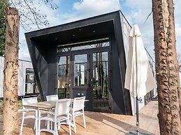 Modern Chalet by the River Maas