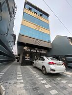 W & H View Residency