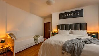 Yellow house with private parking