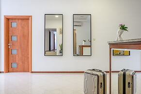 Yellow house with private parking