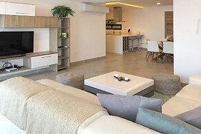 Luxe Condos Complex with Roof Pool