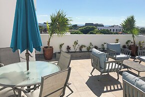 Luxe Condos Complex with Roof Pool