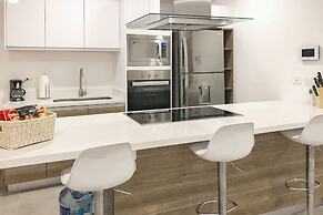 Luxe Condos Complex with Roof Pool