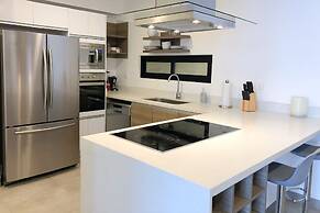 Luxe Condos Complex with Roof Pool