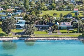 The Golden Pohutukawa Beach House