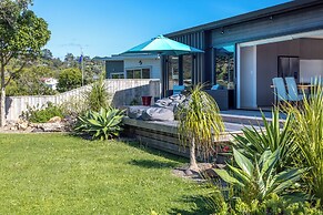 The Golden Pohutukawa Beach House
