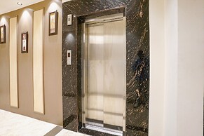 Fabhotel Status Residency