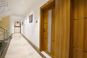 Fabhotel Status Residency