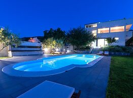 Serene Rural Villa With Pool, Sun Deck, and Children's Play Area