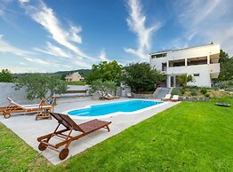 Serene Rural Villa With Pool, Sun Deck, and Children's Play Area