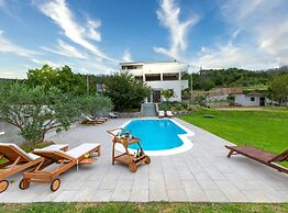 Serene Rural Villa With Pool, Sun Deck, and Children's Play Area