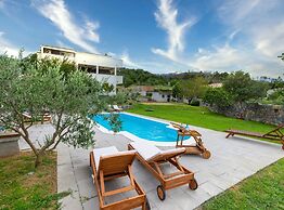 Serene Rural Villa With Pool, Sun Deck, and Children's Play Area