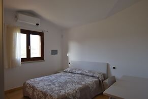 Luisa Apartment In Budoni Shared Pool