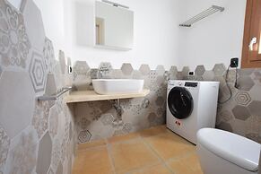 Luisa Apartment In Budoni Shared Pool