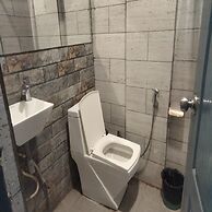 The Clock Tower Rooms & Cafe