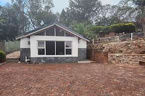 Room 1 of 8 Cozy Suites The Hilltop Guesthouse