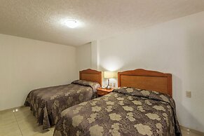 Suites Poliforum Inn