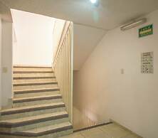 Suites Poliforum Inn