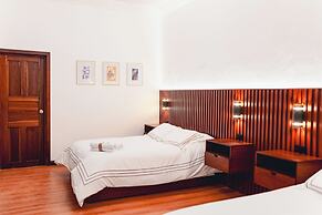 Casa 11-24 by Casa Bolivar