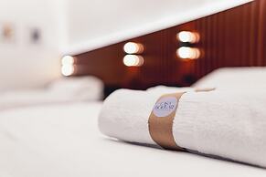 Casa 11-24 by Casa Bolivar