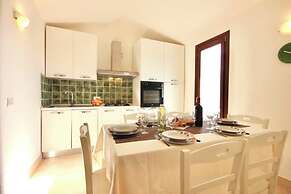 Villas with common or private pool in Costa Rei