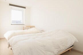 Apartment Close to the sea Wall of Mariakerke