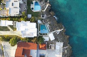 The W Villa 5 B R Oceanfront w Staff