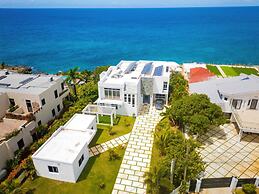 The W Villa 5 B R Oceanfront w Staff