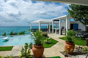 The W Villa 5 B R Oceanfront w Staff