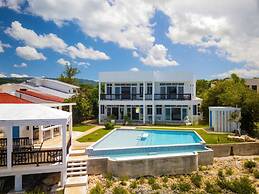 The W Villa 5 B R Oceanfront w Staff