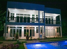 The W Villa 5 B R Oceanfront w Staff