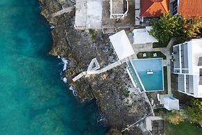 The W Villa 5 B R Oceanfront w Staff