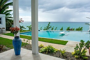 The W Villa 5 B R Oceanfront w Staff