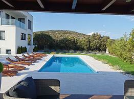 Modern Villa With Private Heated Pool and Lounge Area for a Relaxing S
