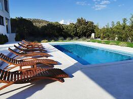 Modern Villa With Private Heated Pool and Lounge Area for a Relaxing S