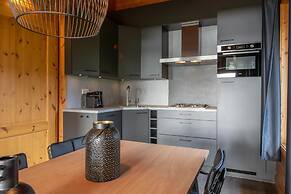 Restyled Wooden Lodge Near the Maasduinen