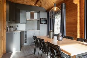 Restyled Wooden Lodge Near the Maasduinen