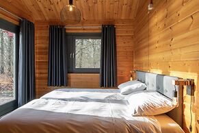 Restyled Wooden Lodge Near the Maasduinen