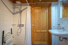 Restyled Wooden Lodge Near the Maasduinen