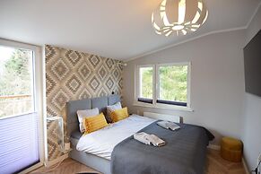 Holiday Home With Sauna and hot Tub, Directly at the Lake