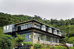 IBEX STAYS AND TRAILS VALPARAI TALE ROCK