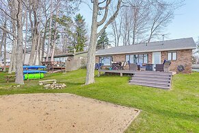 Dock & Views: Lake Mitchell Home in Cadillac!