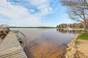 Dock & Views: Lake Mitchell Home in Cadillac!