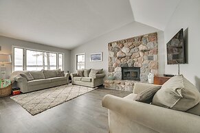 Dock & Views: Lake Mitchell Home in Cadillac!