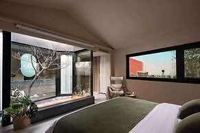 Moya Hotel - Qingdao Laoshan Scenic Area