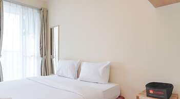 Homey And Cozy Studio Room Tifolia Apartment