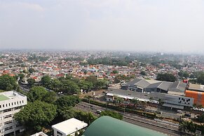 Great Location And Comfy 1Br Apartment Woodland Park Residence