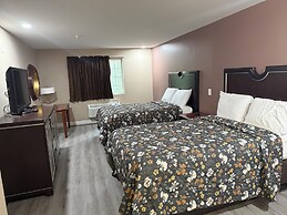 Magnolia Bay Hotel & Suites