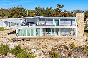 Dock & Fire Pit: Riverfront Runaway Bay Retreat