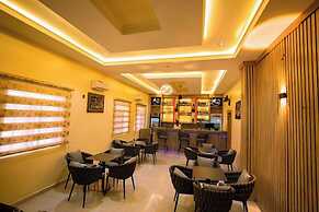AJ'S HOTEL AND SUITES